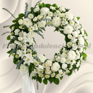 Corona consuelo en mix flores de temporada (Tonos blancos)