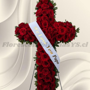 Corona cruz floral en 65 rosas importadas y cinta personalizada