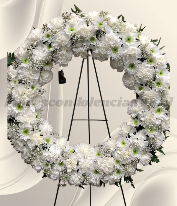 Corona fúnebre en claveles, margaritas y maules blancos