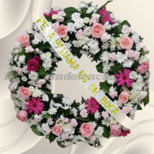 Corona luz en rosas, gerberas, maules y margaritas, incluye cinta